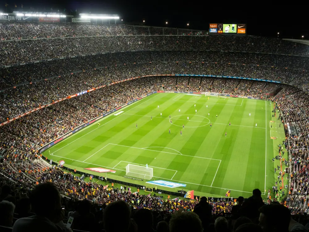 Packed football stadium during a live match